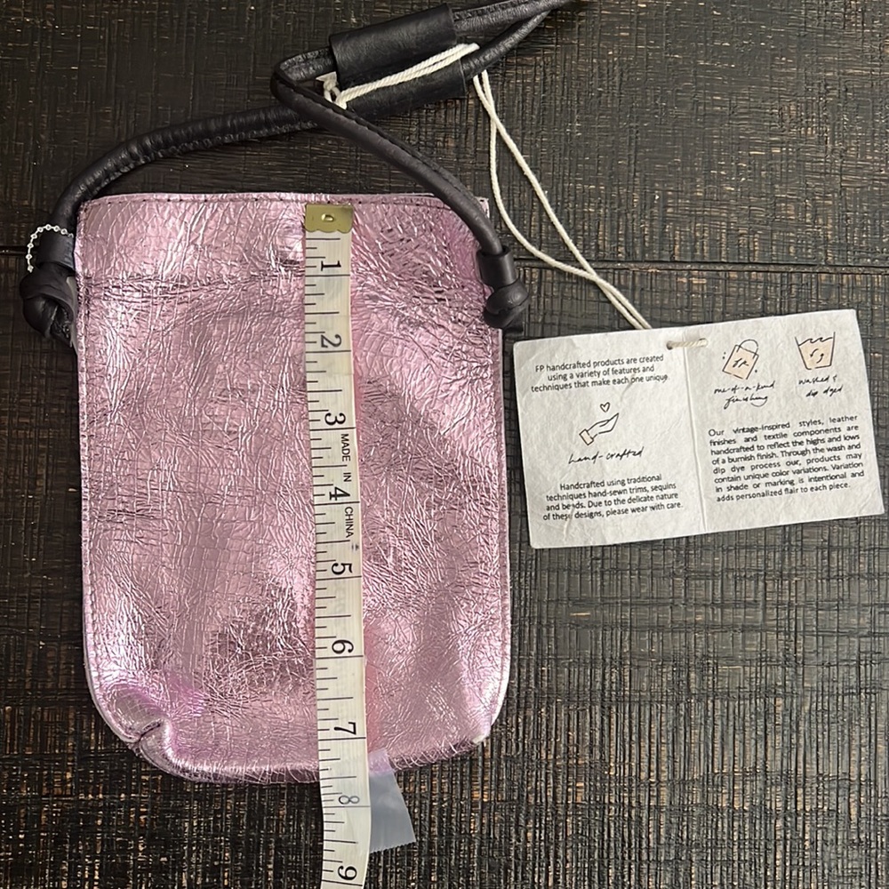 Free People Crossbody style, metallic leather fabrication, pouch design. - Picture 6 of 8